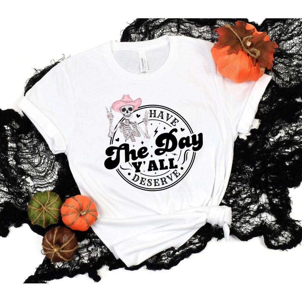 Western Halloween Shirt, Have the Day You Deserve, Cowboy Skeleton Halloween T-Shirt - Western Inspired Spooky Halloween Unisex Tee Graphic